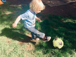 Toddler Kicking Ball Outdoor Activity
